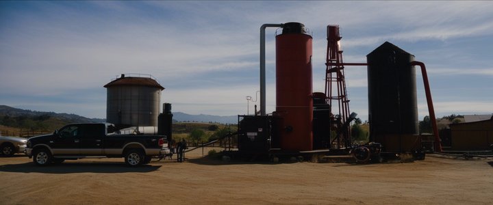 Flames engulf a wood pellet mill in a California industrial area.